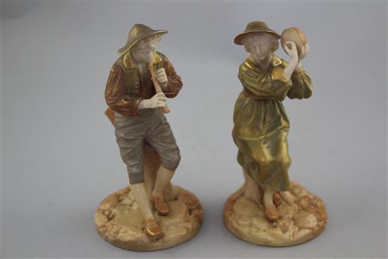 Two Royal Worcester shot enamels figures of a shepherd and shepherdess, modelled by James Hadley, 15.5cm and 15cm